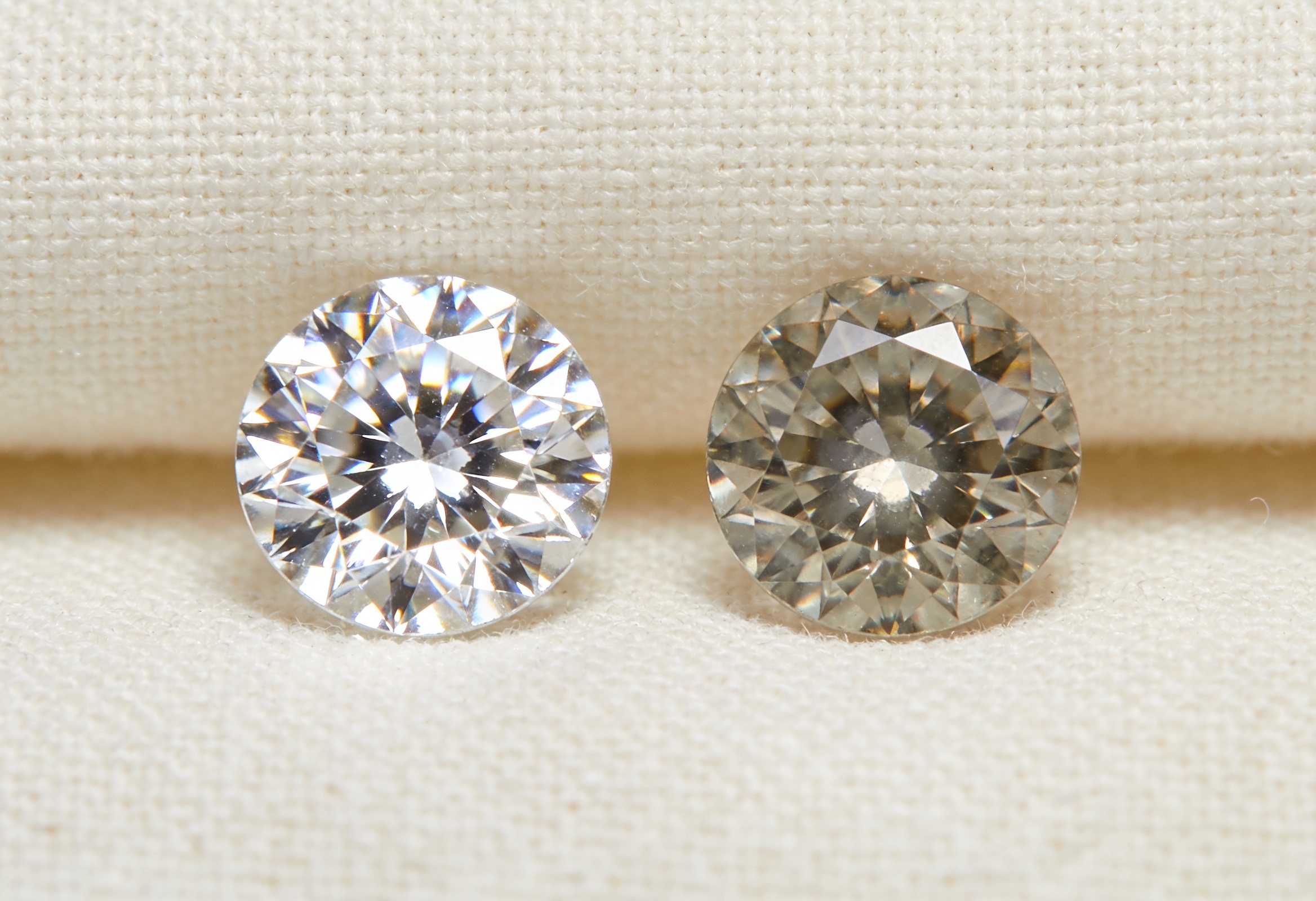 Diamond Cut Grades: Why Cut Matters Most 2 Two diamonds comparing an excellent cut to a duller cut