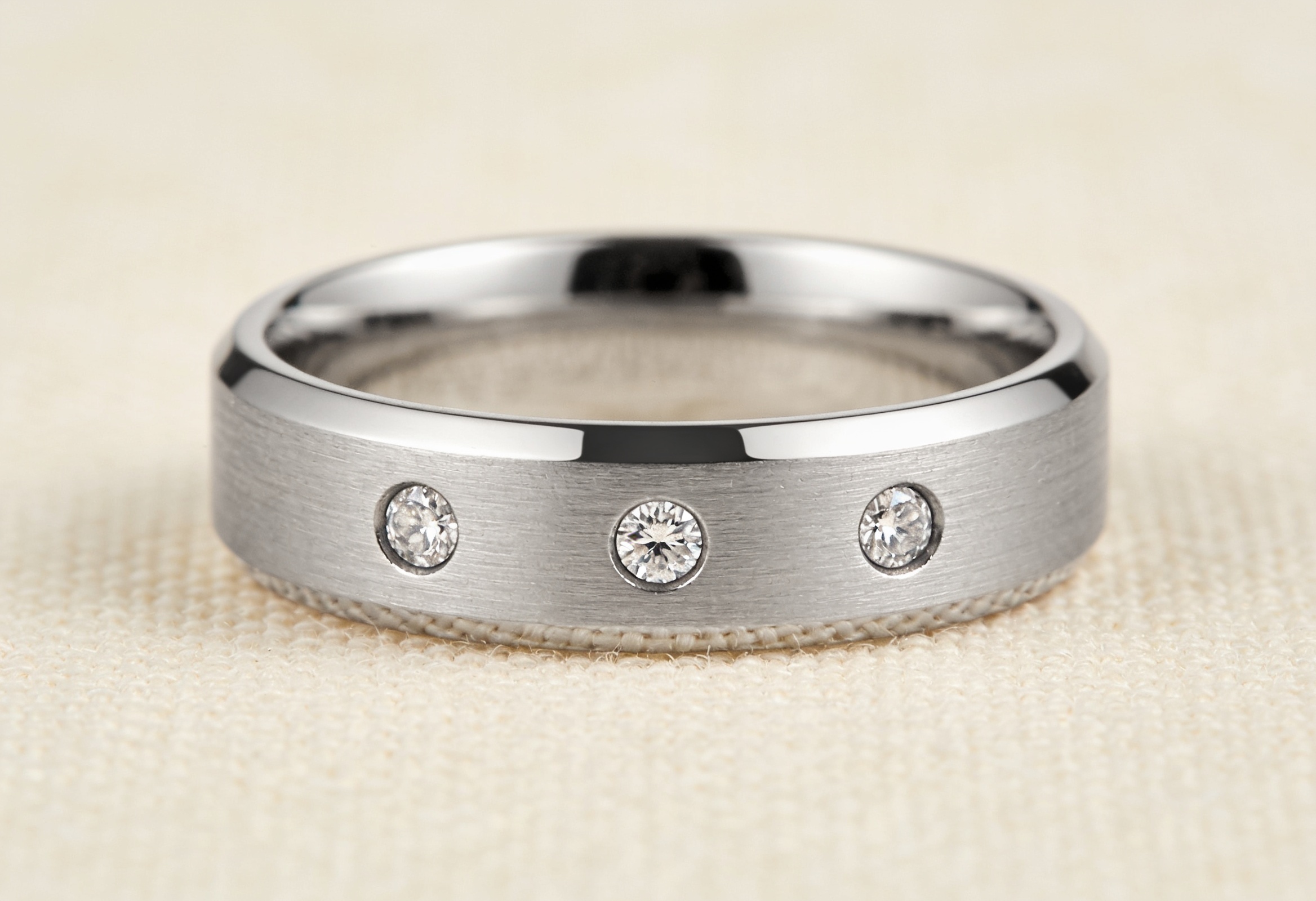 Men's brushed wedding band with three flush-set lab grown diamonds