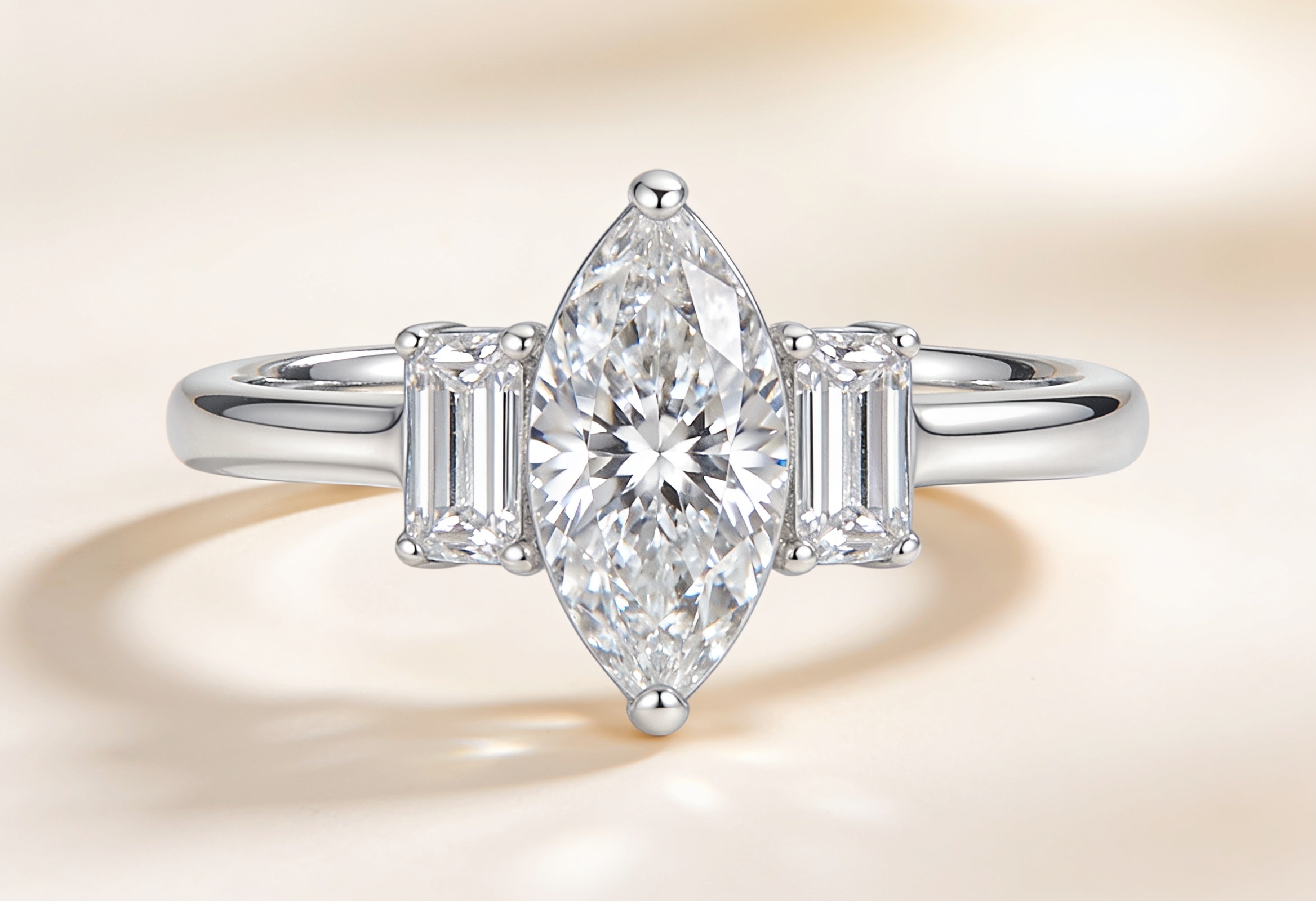 Marquise Engagement Rings Canada 5 Marquise cut lab grown diamond three stone engagement ring with baguettes