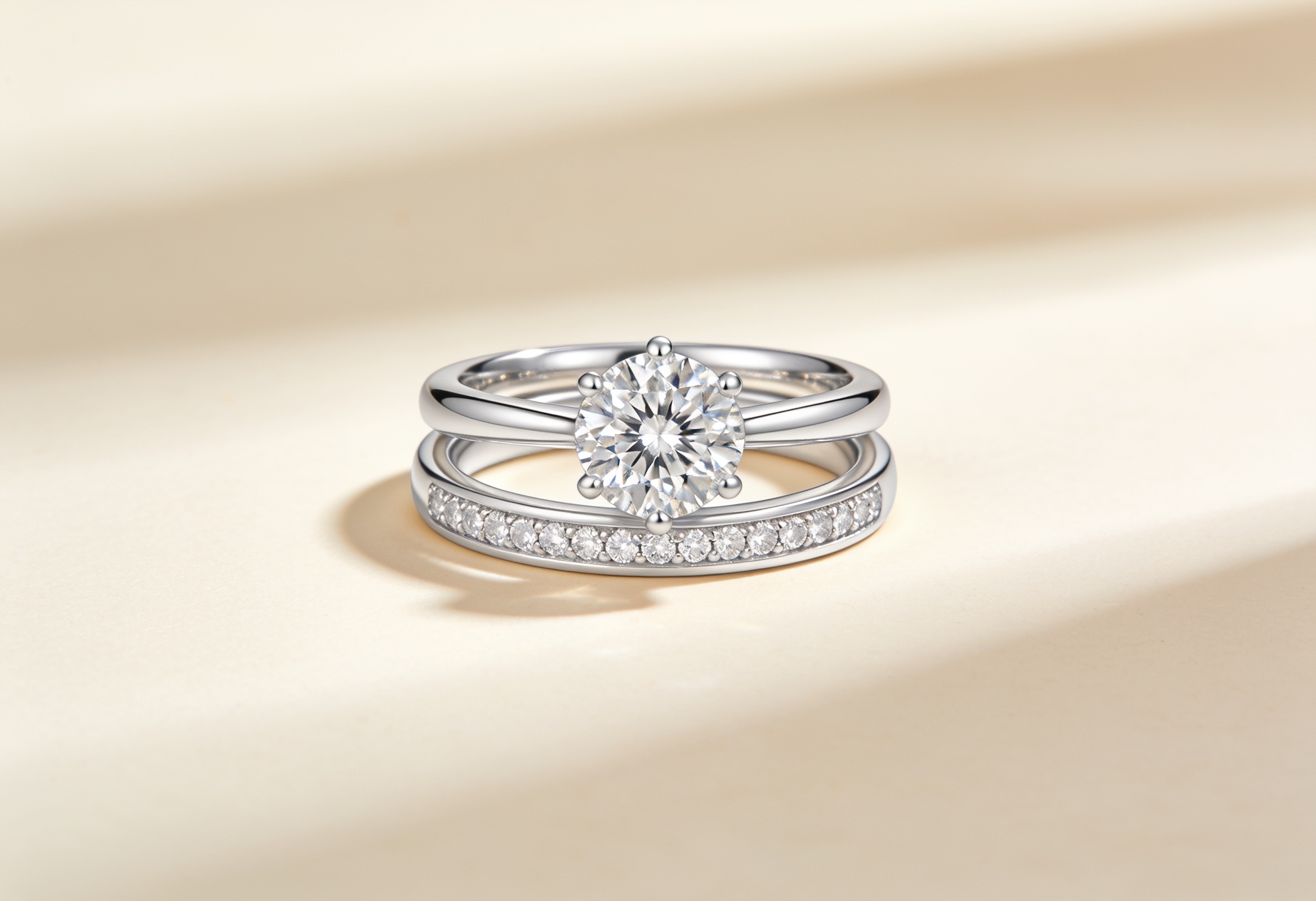 Women's bridal wedding ring set with a solitaire engagement ring and matching pave band