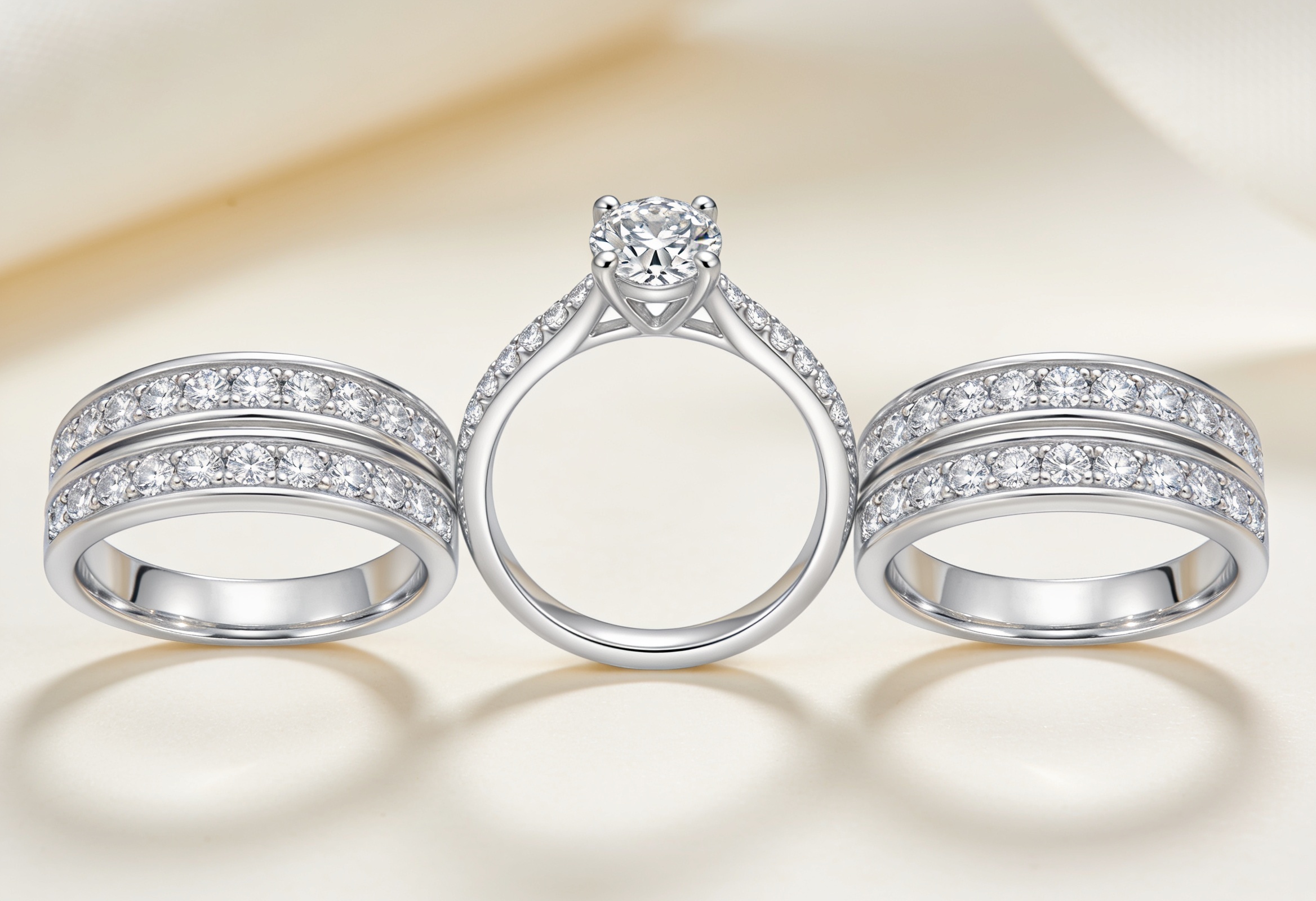 Three-piece women's bridal set with an engagement ring and two bands