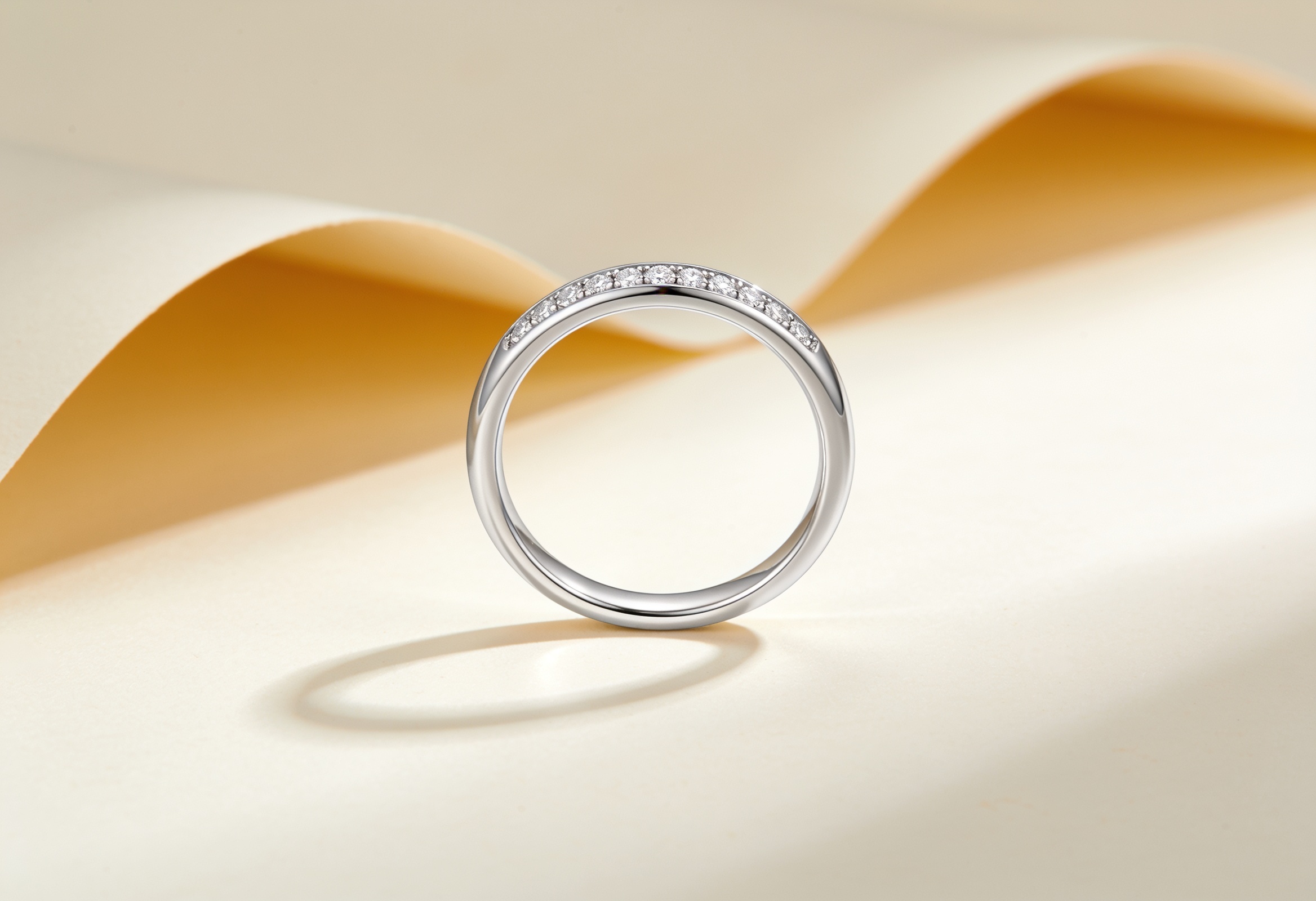 Women's wedding band set with a row of pave lab grown diamonds in white gold